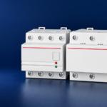 SUTON DZ47-125V1 automatic-reset voltage protector family: disconnected product on a dark editorial background