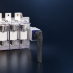 SUTON ETGLR three-fuse switch-disconnector: disconnected product on a dark editorial background