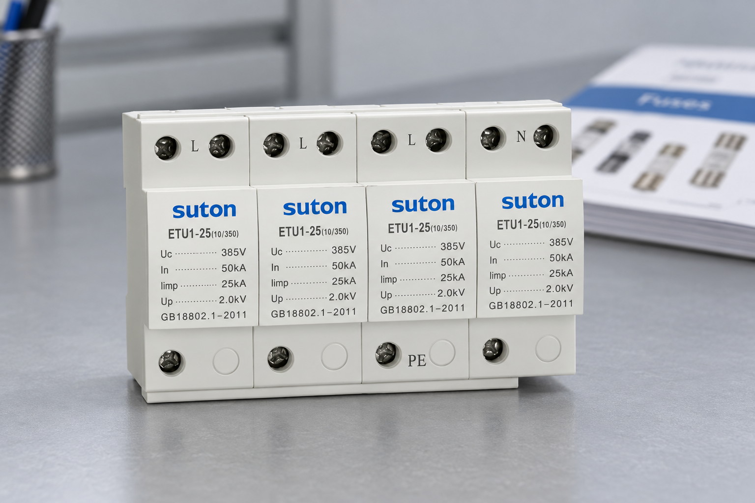 SUTON ETU1 four-module surge protective device, front housing and labeled terminals during product documentation review