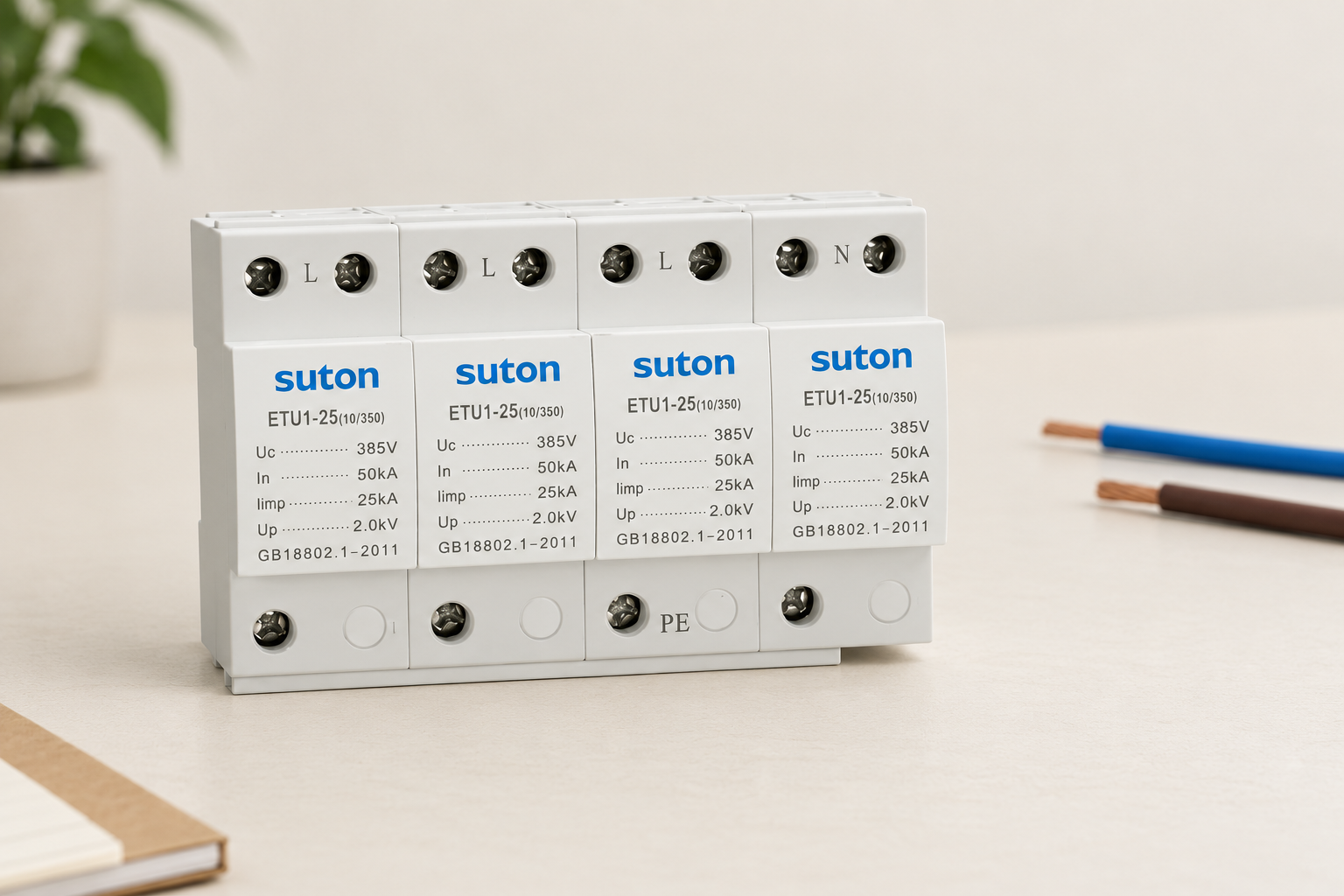 SUTON ETU1 four-module surge protective device, front housing and labeled terminals during product documentation review