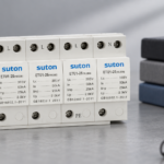 SUTON ETU1 four-module surge protective device, disconnected product on a specification review desk
