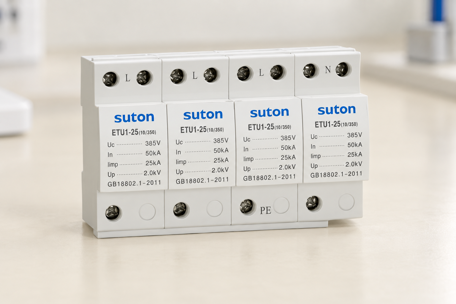 SUTON ETU1 four-module surge protective device, front housing and labeled terminals during product documentation review
